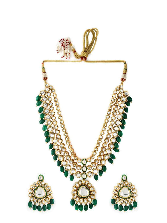 Pooja Raina in Kundan layered Necklace with Green Hangings.
