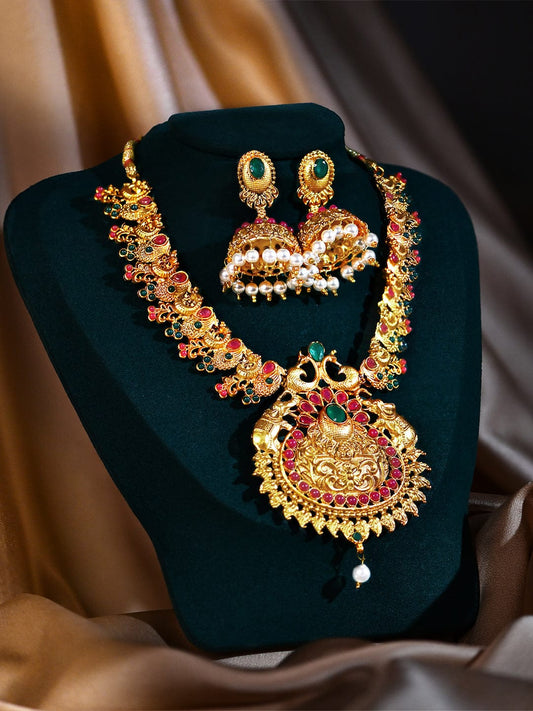 Rubans Gold Plated Handcrafted Traditional Pearl Embellished Faux Ruby And Emerald Studded Divine Lakshmi Necklace Set