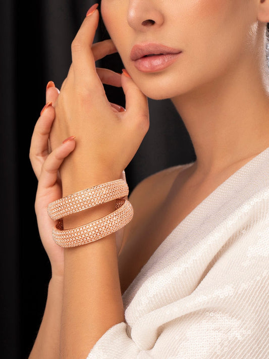 Rubans Rose gold plated bangles with studded american diamonds.