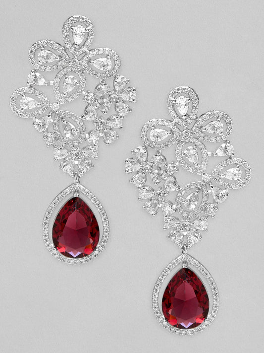 Rubans silver plated earrings with studded american diamonds and red stones.