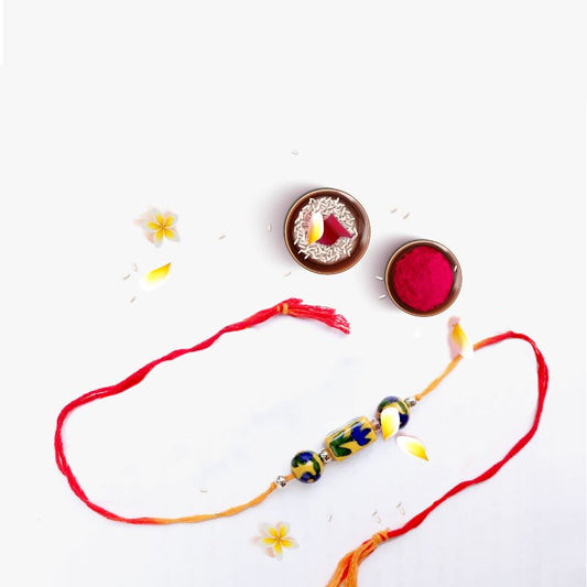 Yellow Pottery Rakhi
