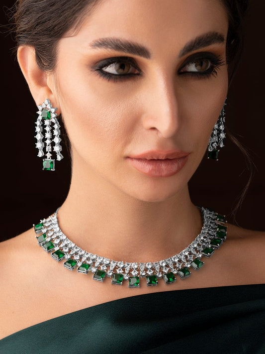 Rubans Silver Plated Necklace Set With American Diamonds And Green Stones.